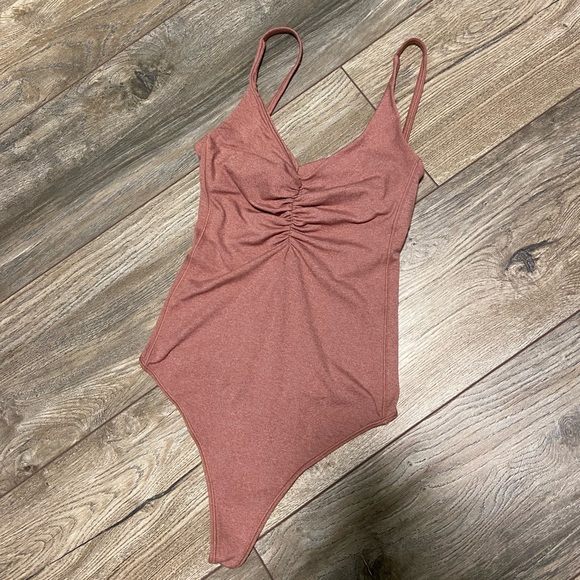 lululemon athletica Tops - Lululemon Pretty Pursuit bodysuit